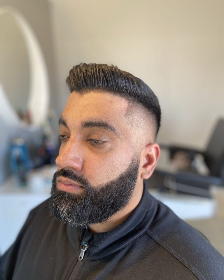 Men's short fade blended into a full beard, Avalon Salon Calgary