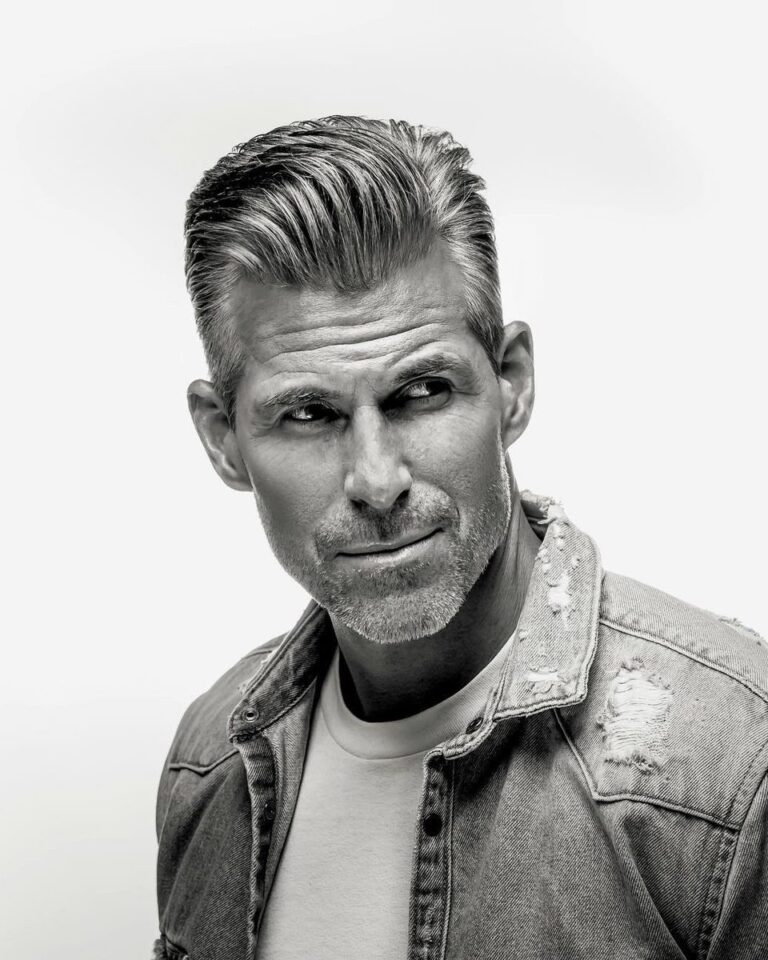 Men's swept-back grey hair with short sides, black and white portrait, Avalon Salon Calgary
