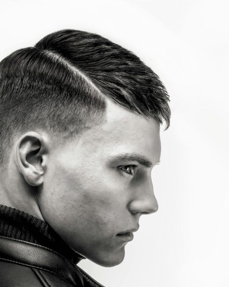Men's hard-part crop with a skin fade, black and white profile, Avalon Salon Calgary
